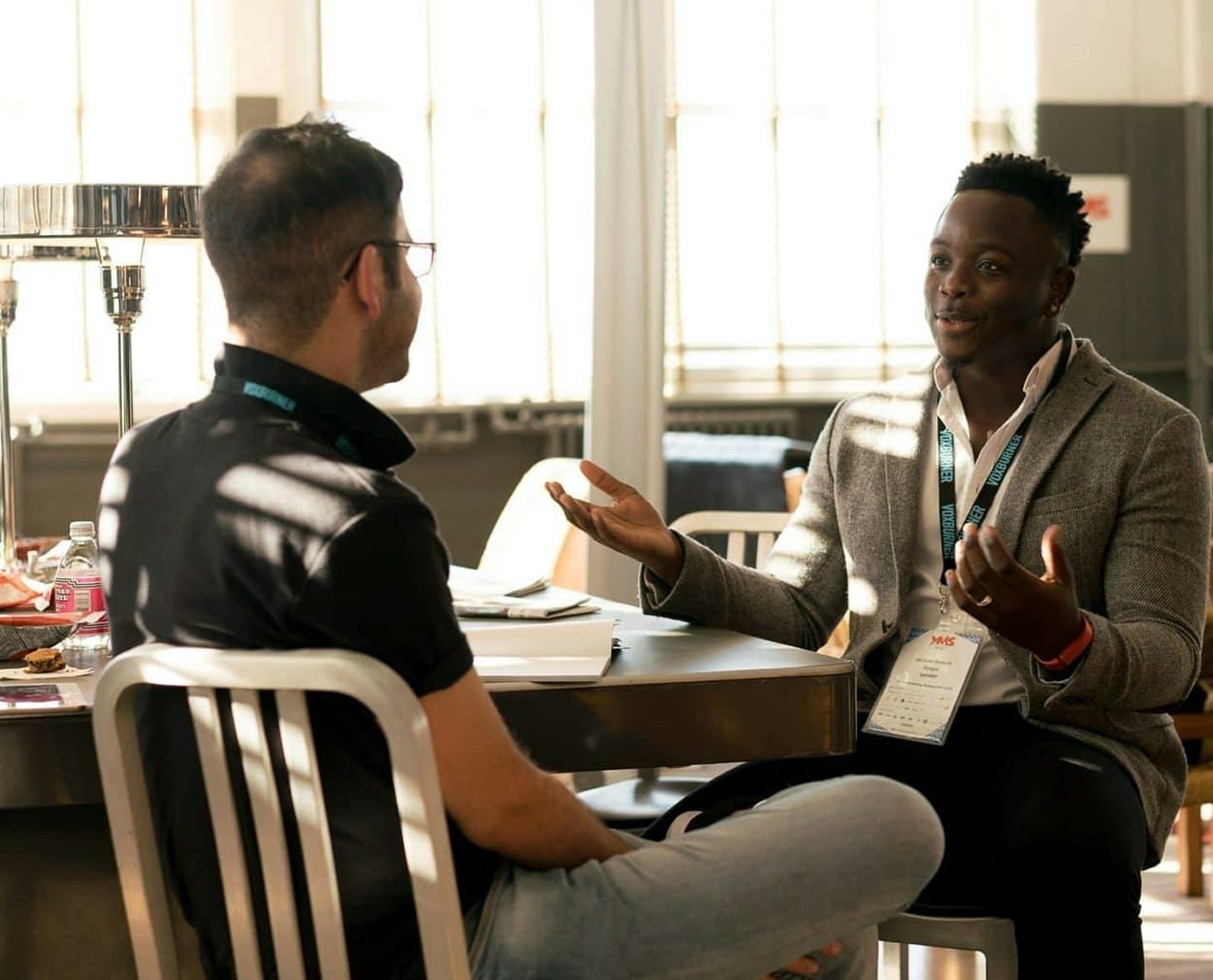 Mentor and mentee discussing business